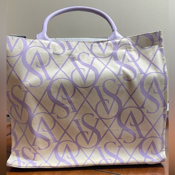 Victoria Secret bag with some beauty products is side - Picture 3 of 9